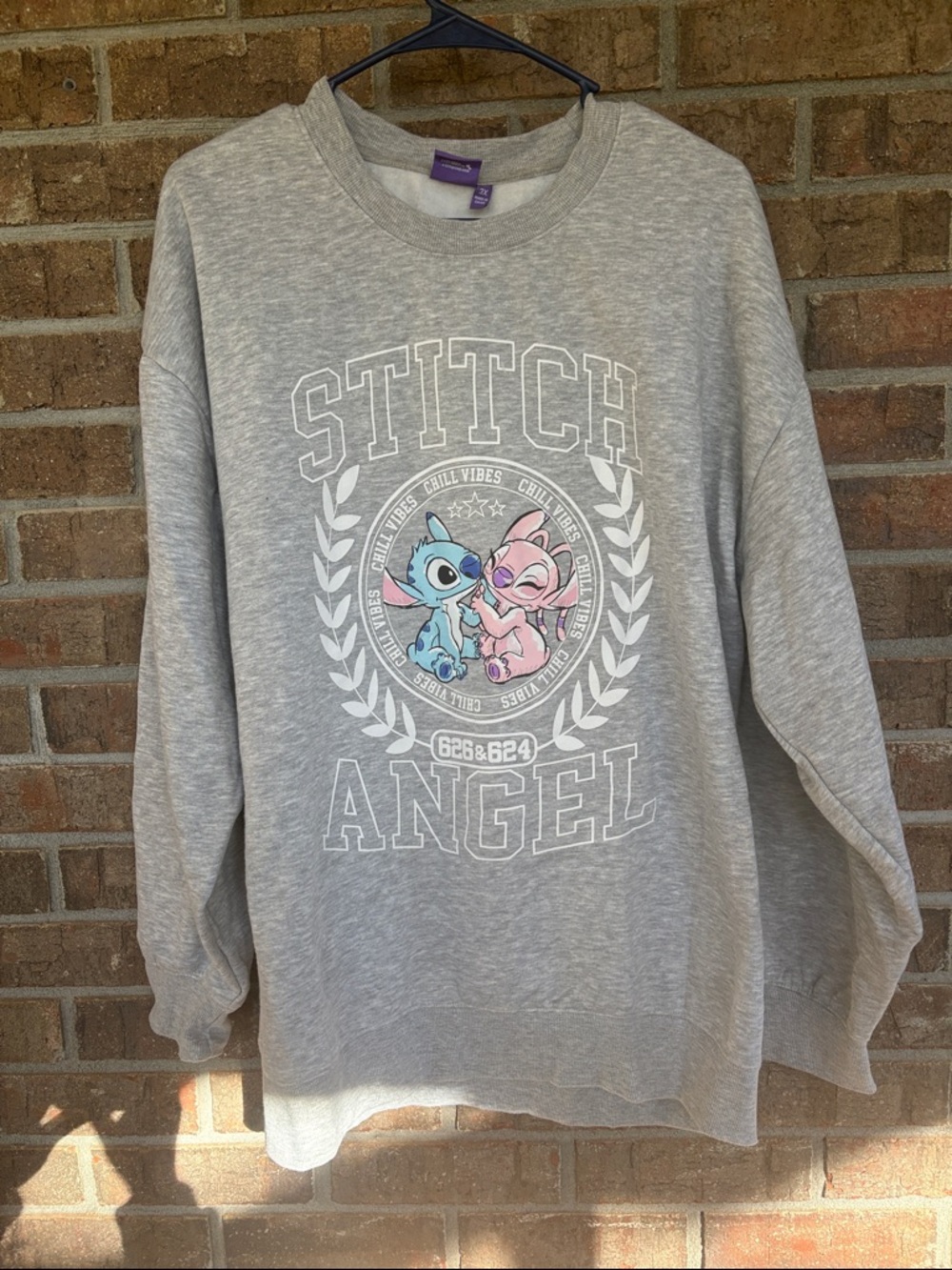 Disney Gray Crewneck Sweatshirt with Blue & Pink Stitch and Angel Graphic